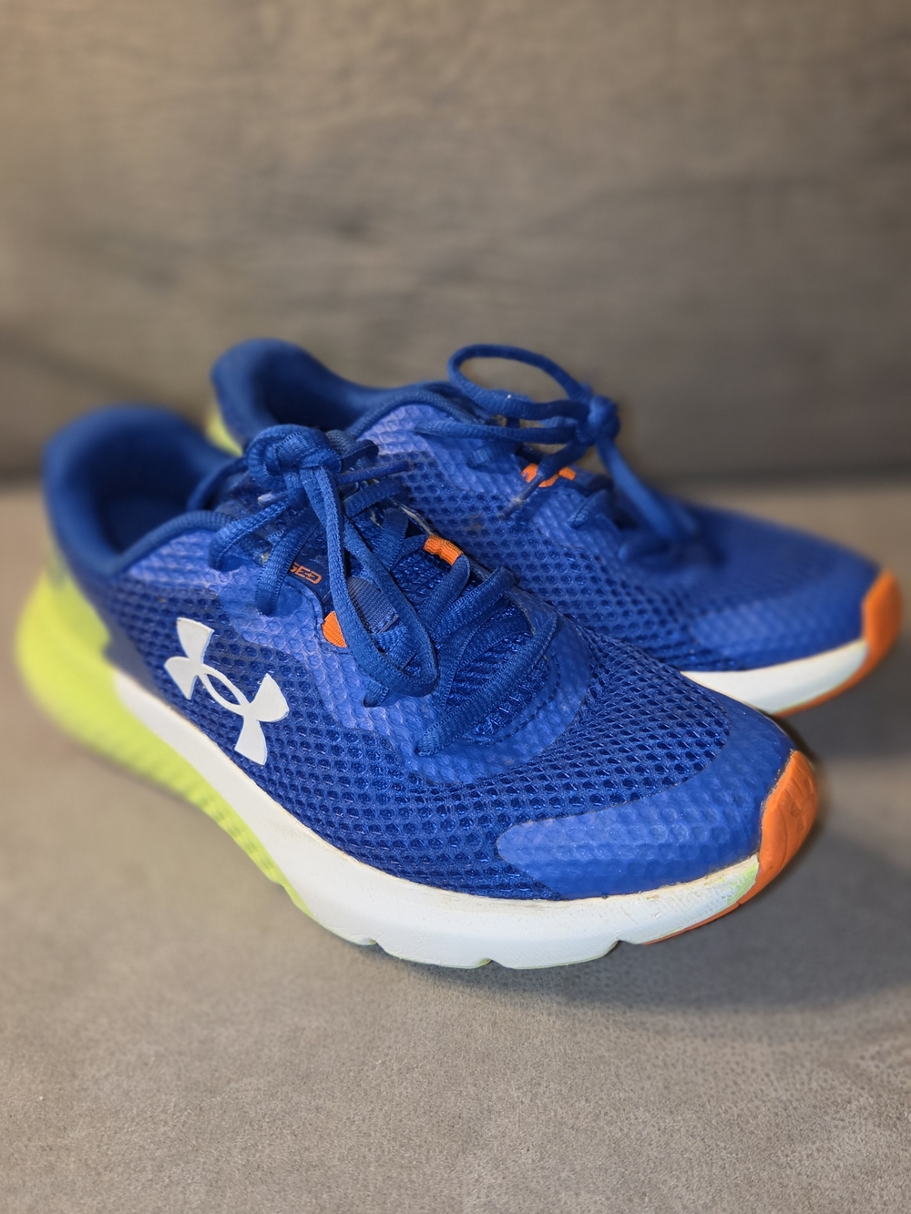 Under Armour Kids' Blue Mesh Running Shoes with Orange Accents
